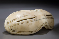 Inuit snow-goggles carved